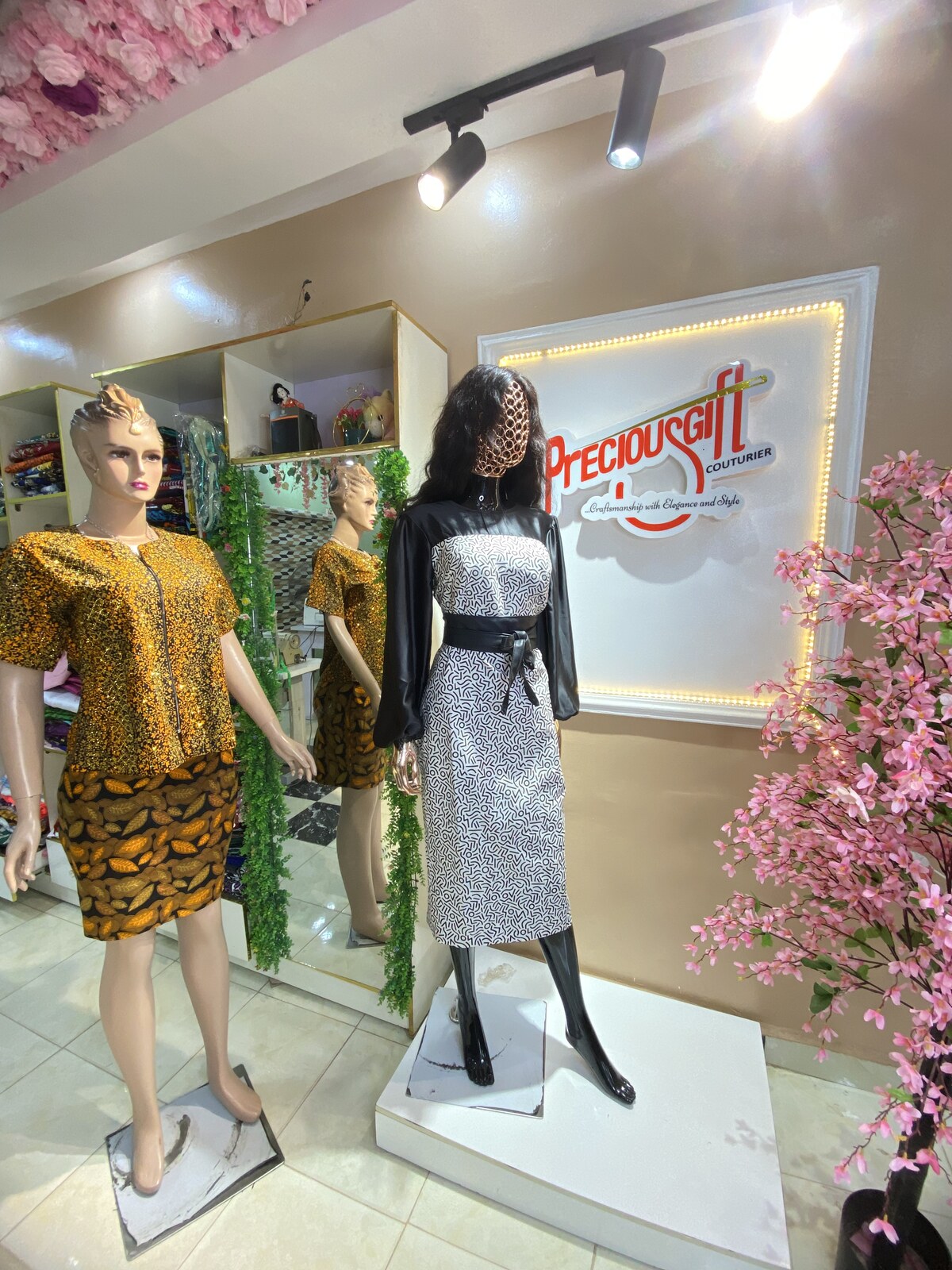 Ankara two-piece beside monochrome belted dress